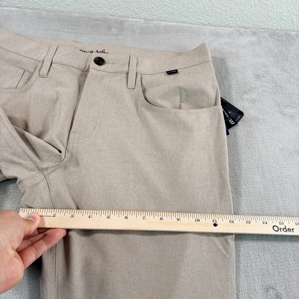 Travis Mathew Open to Close Golf Performance Pants in Khaki Men 34x32 Tag 33 NWT